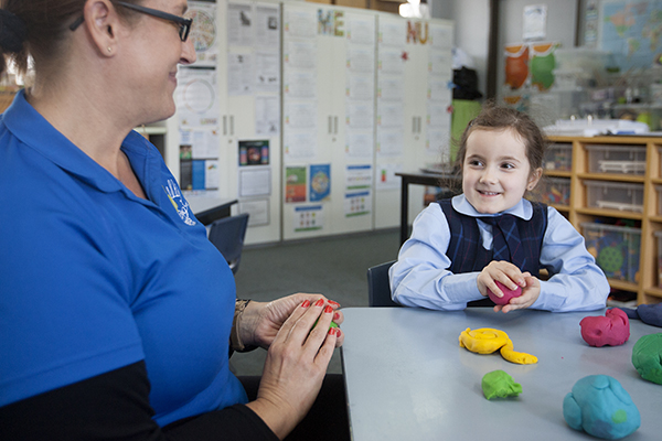 student with carer for school care